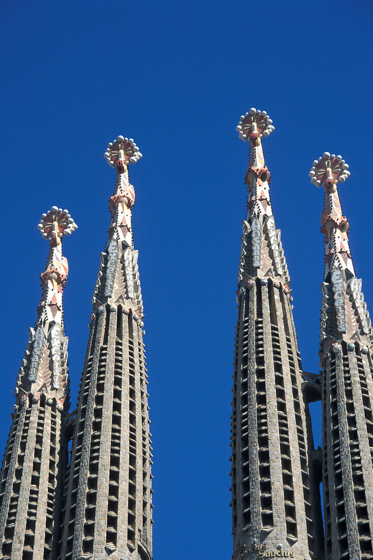 The steeples of the basilica Sagrada Familia in the sunlight, Barcelona, Spain, Europe