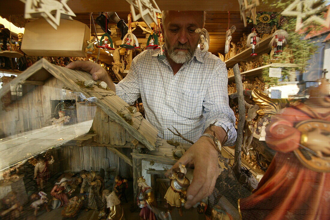 Man selling of carved wooden objects, Oberammergau, Bavaria, Germany