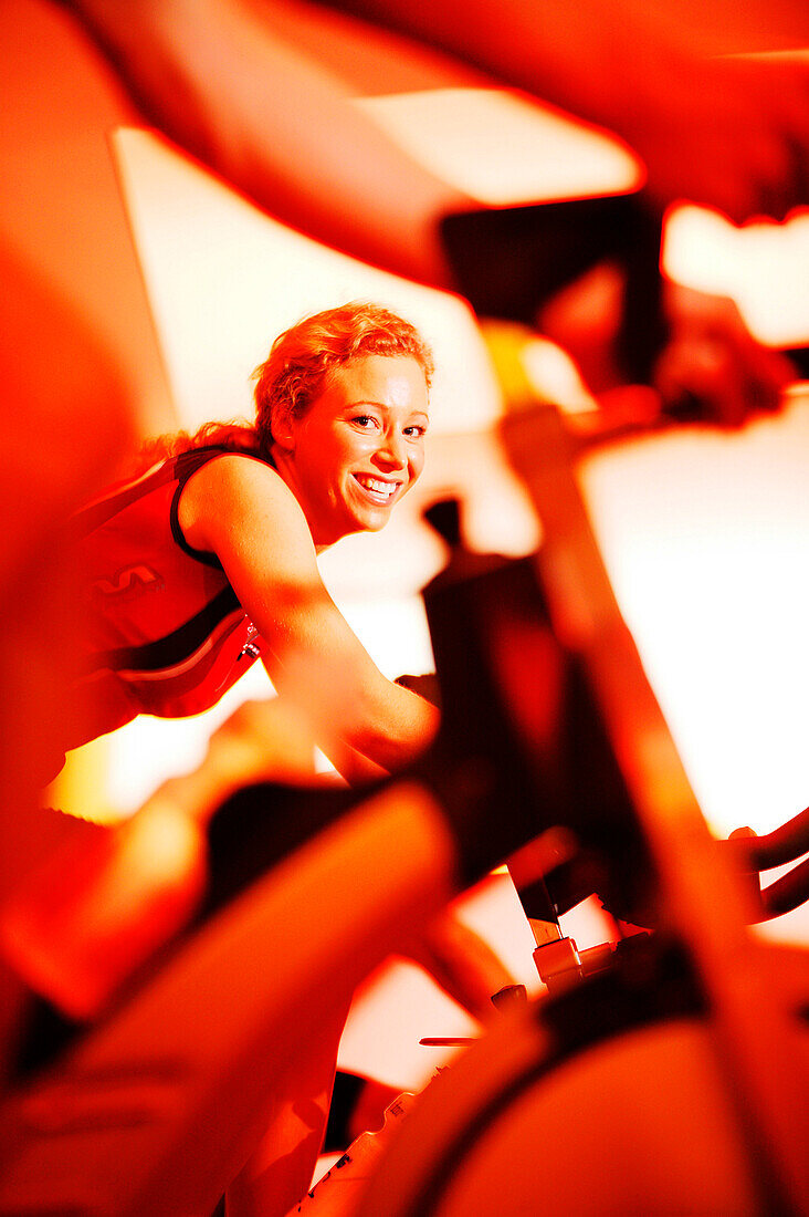 Spinning, Young woman in gym on exercise bikes, Spinning, leos Sports Club Muenchen