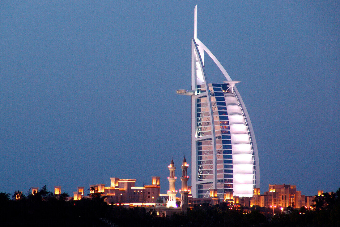 The illuminated Burj al Arab hotel in the evening, Dubai, United Arab Emirates, Middle East, Asia
