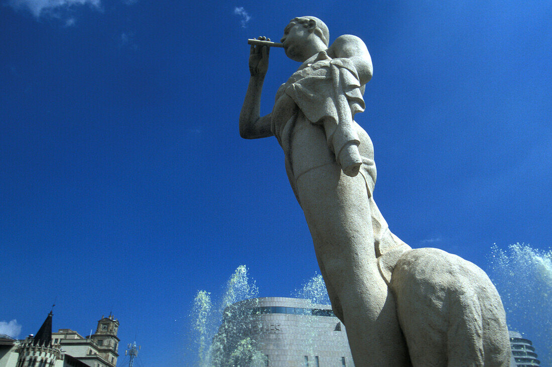 Statue of a shepherd in the sunlight, Plaza de Catalunya, Barcelona, Spain, Europe