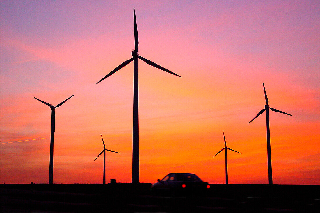 Car in front of a wind park, Wittstock, Mecklenburg-Western Pomerania, Germany