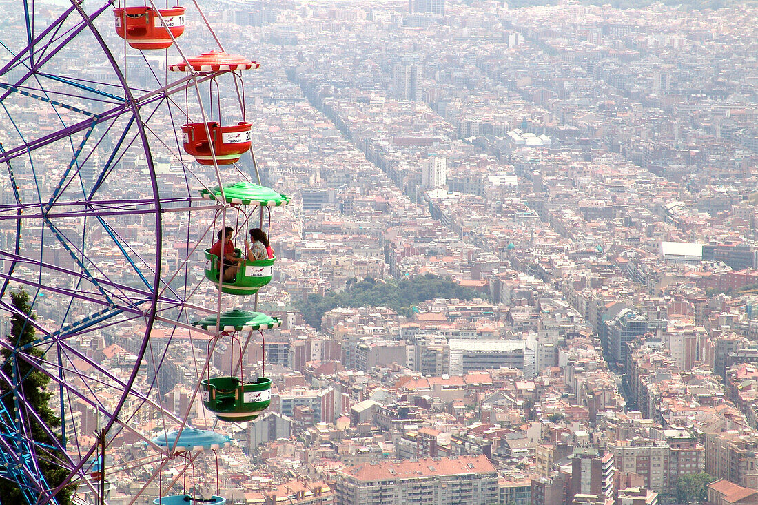 Ferris wheel on Tibidabo mountain with view over the city, Barcelona, Spain, Europe