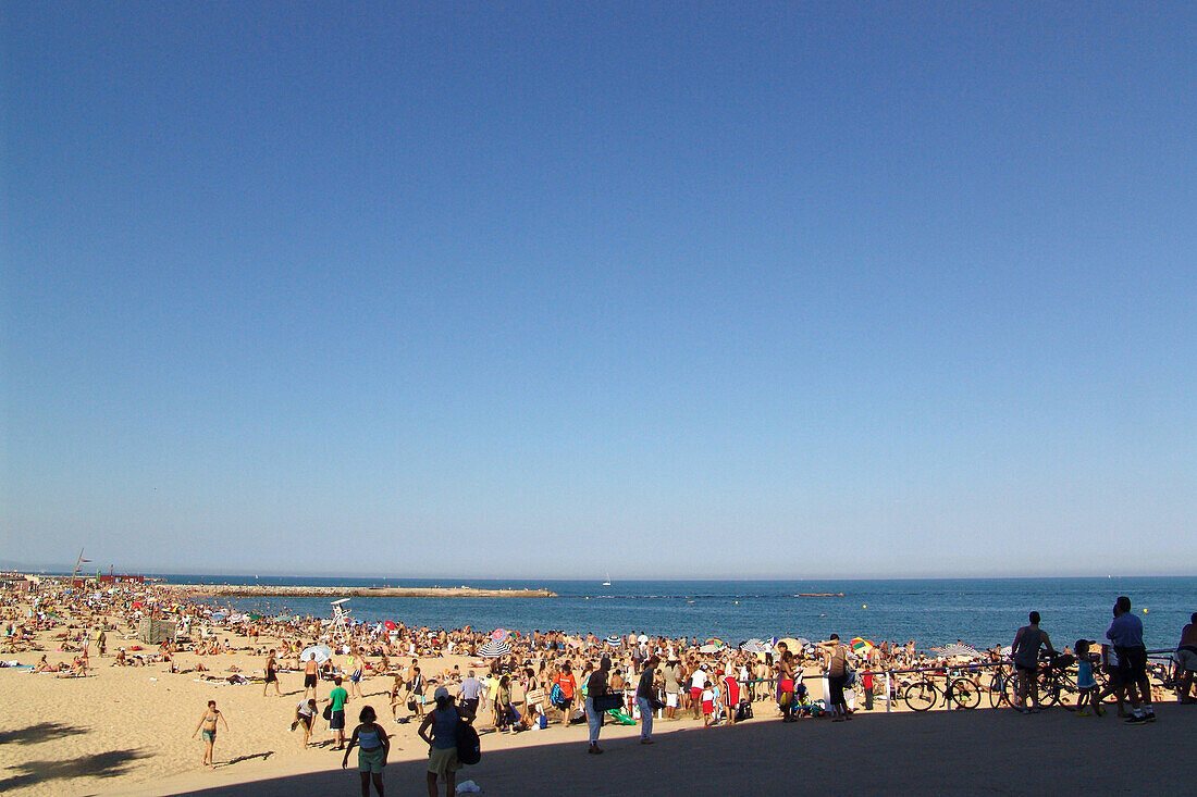 Crowd on the beach, Playa Bogatell, Barcelona, Spain, Europe