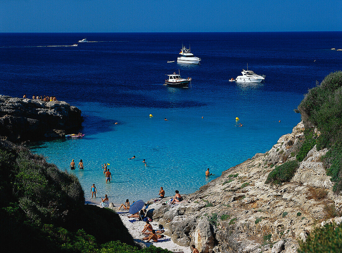 People on the beach, Beach life, Caló Blanc, Minorca, Spain