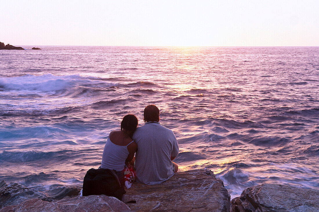 Couple at the beach, seaside, sunset, Centuri-Port, Cap Corse, Corsica, France