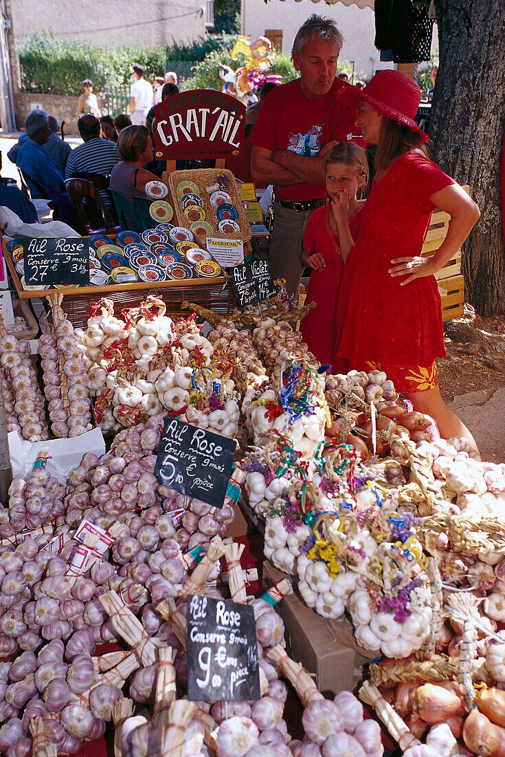 Buying garlic, market, Casamaccioli, Corsica, France