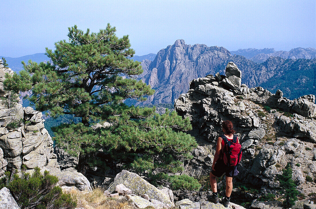 Woman on hiking route GR 20, Bavella Pass, Corsica, France