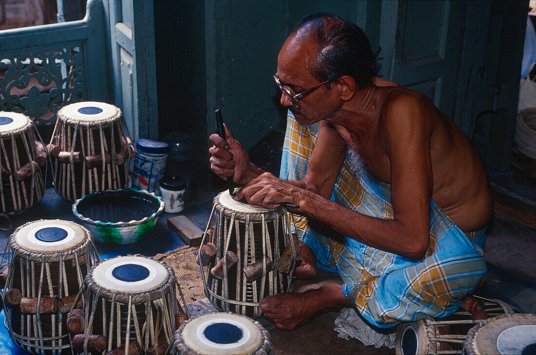 Drum workshop, craftsman , Varanasi, Benares Uttar Pradesh, India