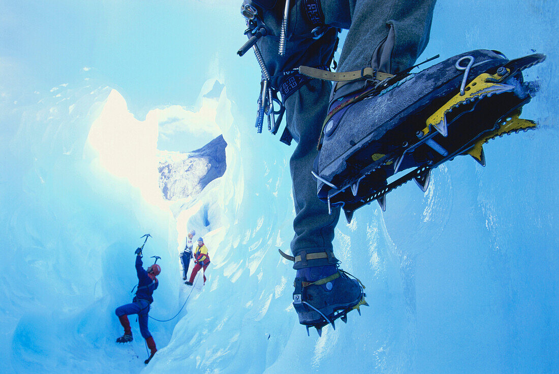 Ice climber on steep climb, Briksdal Glacier, Norway