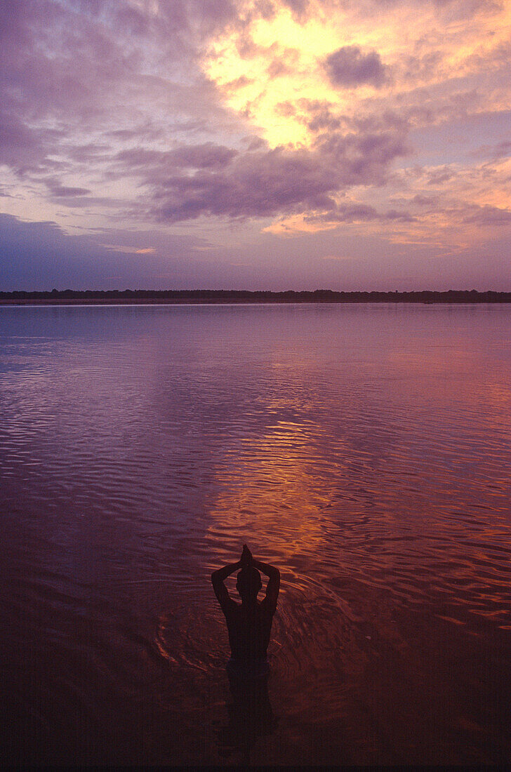 Pilgrim , Ganges river, Kedar Ghat, Varanasi, Benares Uttar Pradesh, India