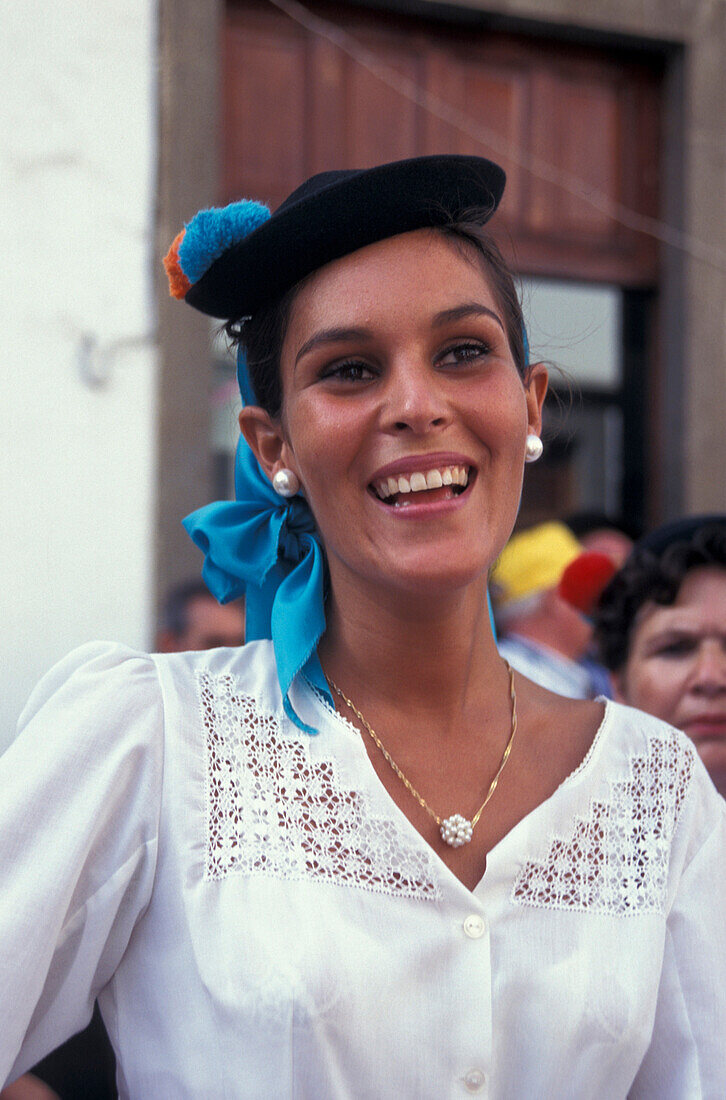 Young woman at pilgrimage to Maria Virgen del Pino, Teror, Gran Canaria, Canary Islands, Spain