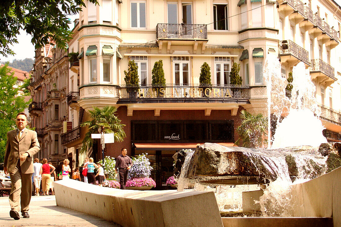 People and buildings at Leopoldsplatz, Baden-Baden, Baden-Wuerttemberg, Germany, Europe