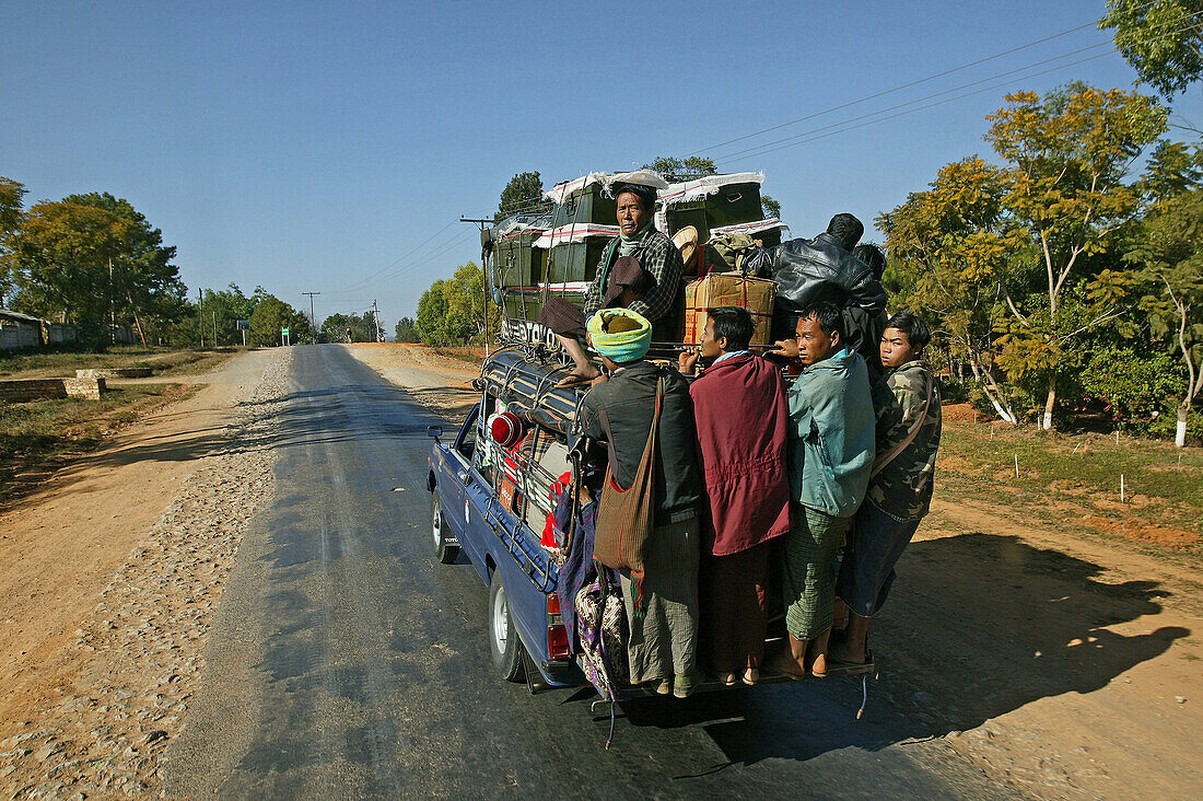 overloaded mini bus, country road, Burma, Myanmar