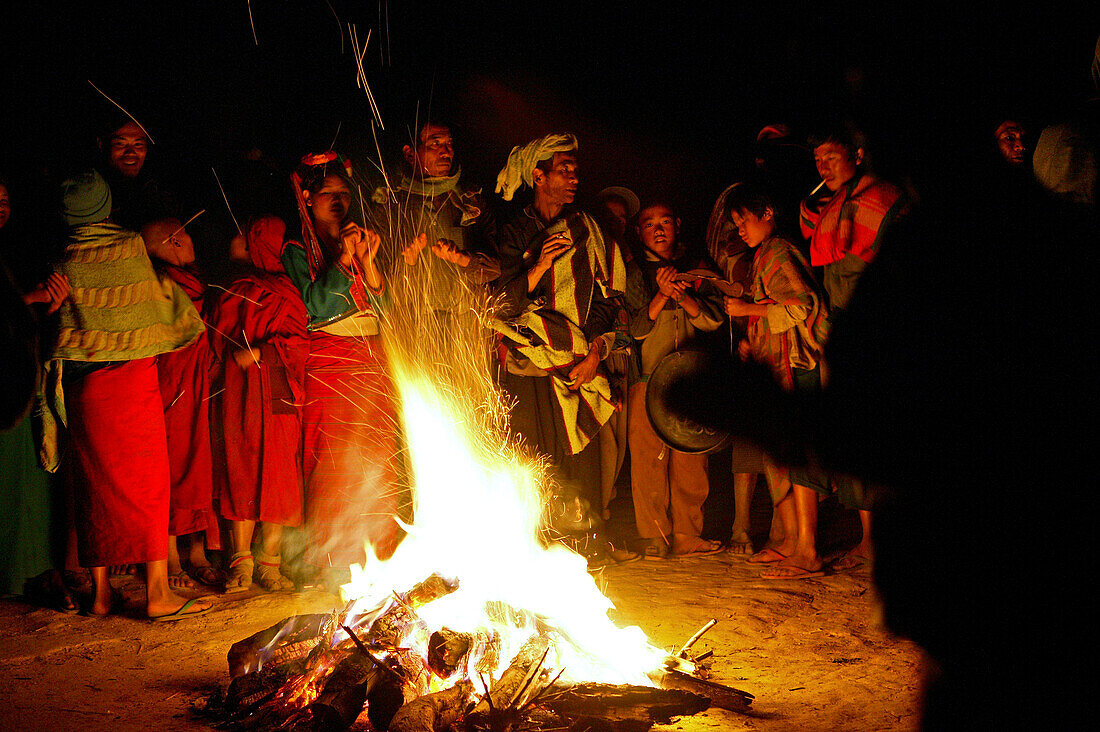 dancing round campfire, Palaung hill tribe, Yasagyi Hills, Myanmar