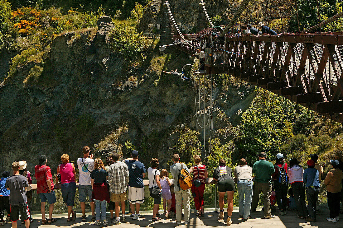 Spectators watching people Bungee jumping from Kawarau bridge, Queenstown, Otago, South Island, New Zealand, Oceania