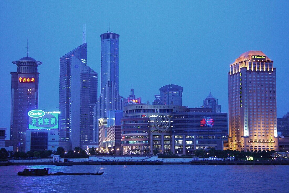 River and skyline of Pudong in the evening, Shanghai, China, Asia