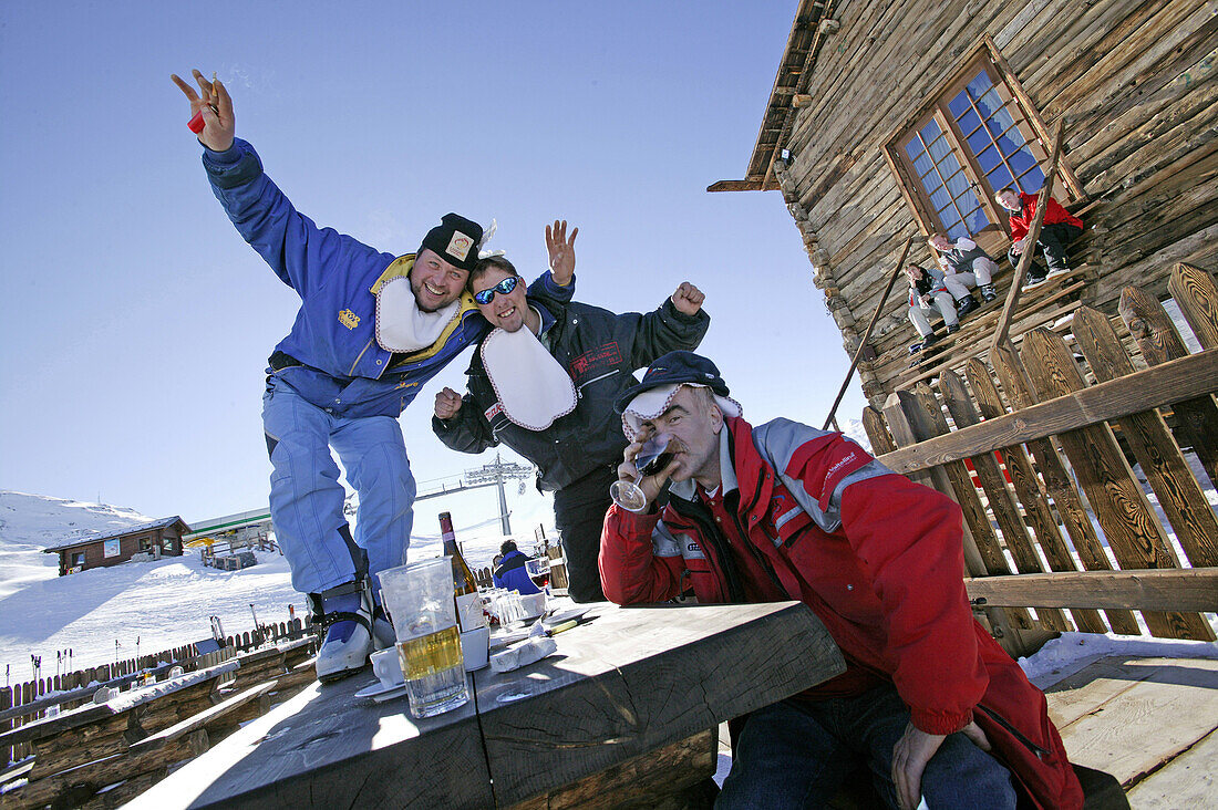 Guests having fun at the ski hut Camanel die Planon, Livigno, Italy