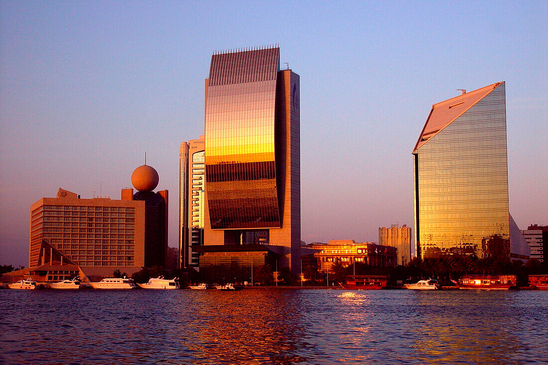 High rise buildings at Dubai Creek in the evening light, Dubai, UAE, United Arab Emirates, Middle East, Asia