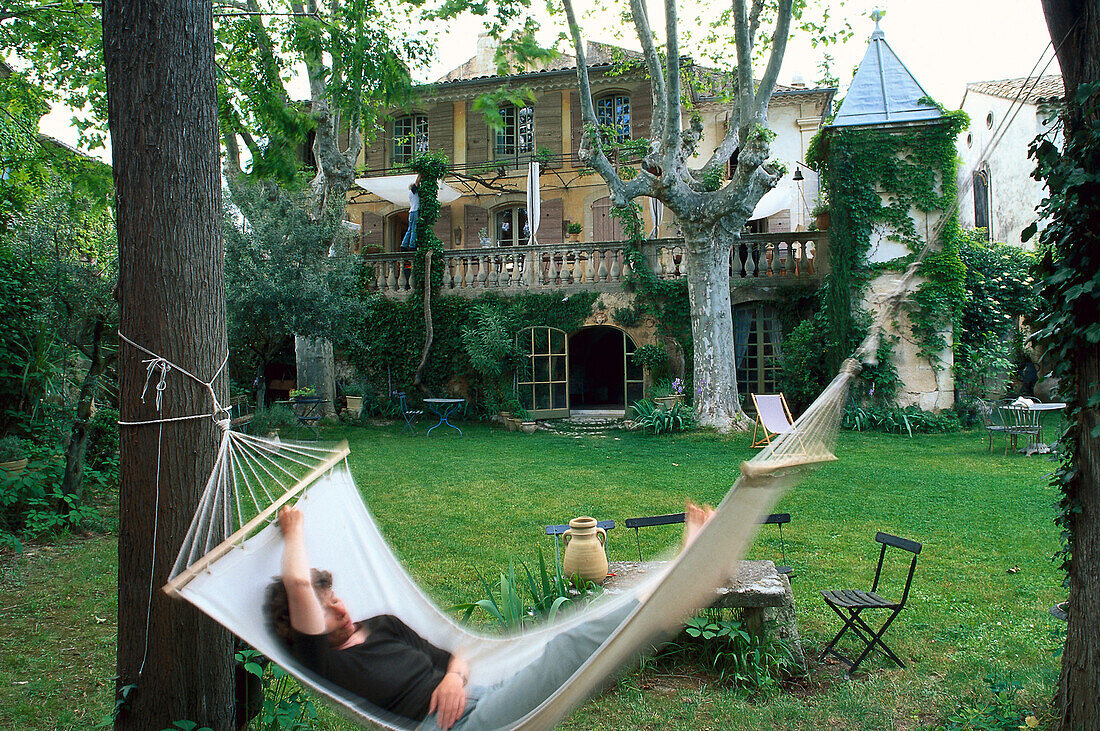 Woman on hammock, Villa Saint Louis Bernadette Lassalette, Lourmarin, Luberon, Provence, France