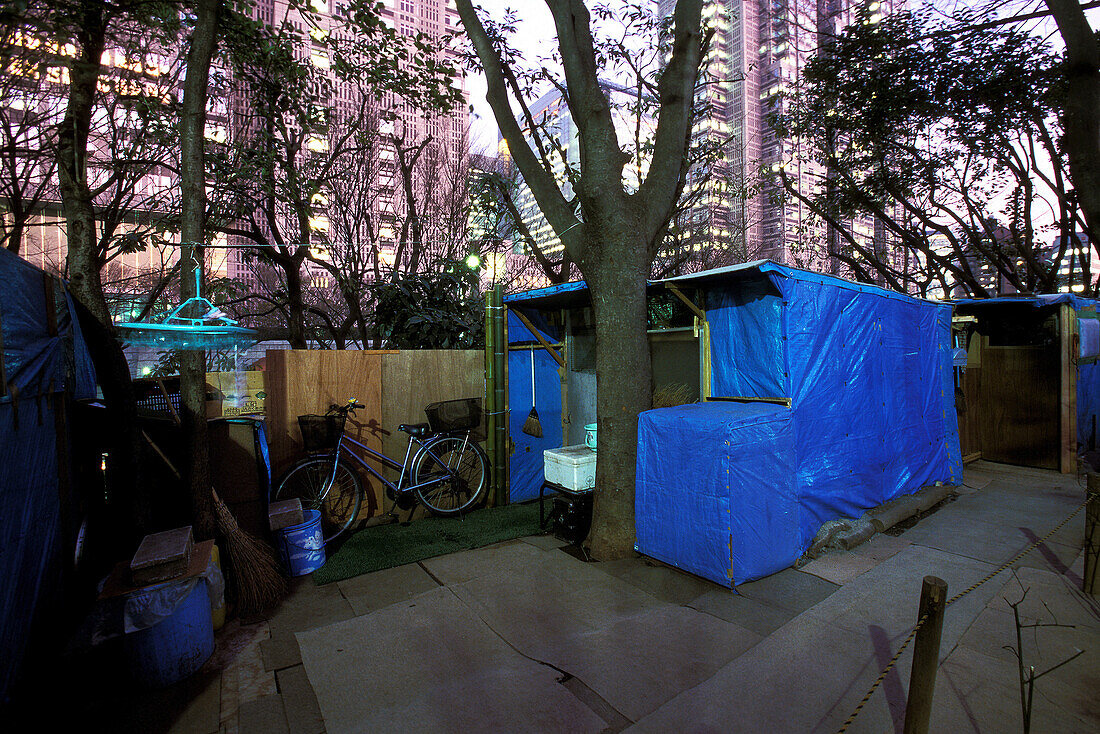 box homes below Metropolitan Government Tower Shinjuku Park, Japan