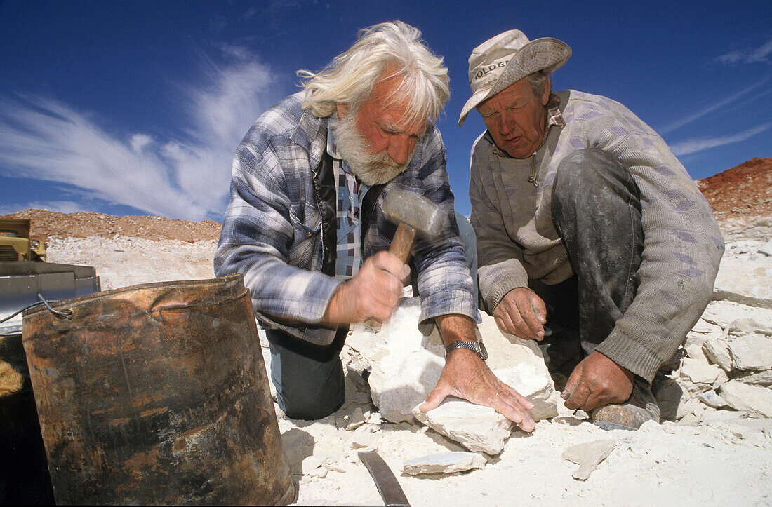 Two older men searching for opals, opal mining fields, Aboriginal Land, Stuart Highway near Marla Opalsiedlung, South Australia