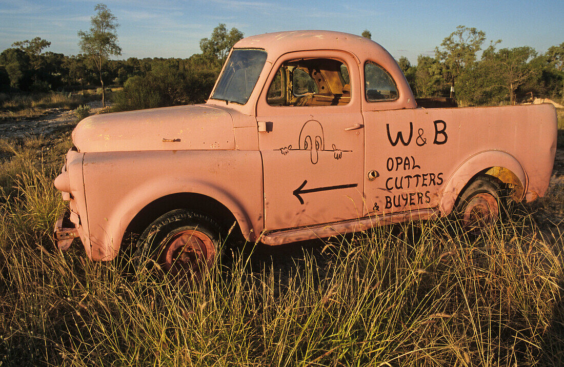 advertising sign, car wreck Lightning Ridge,NSW, Australia