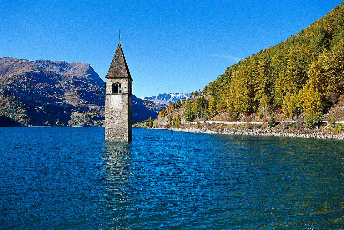 Immersed steeple at lake Reschensee, South Tyrol, Italy, Europe