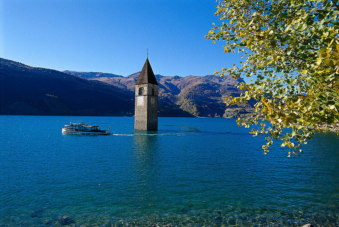 Immersed steeple at lake Reschensee, South Tyrol, Italy, Europe