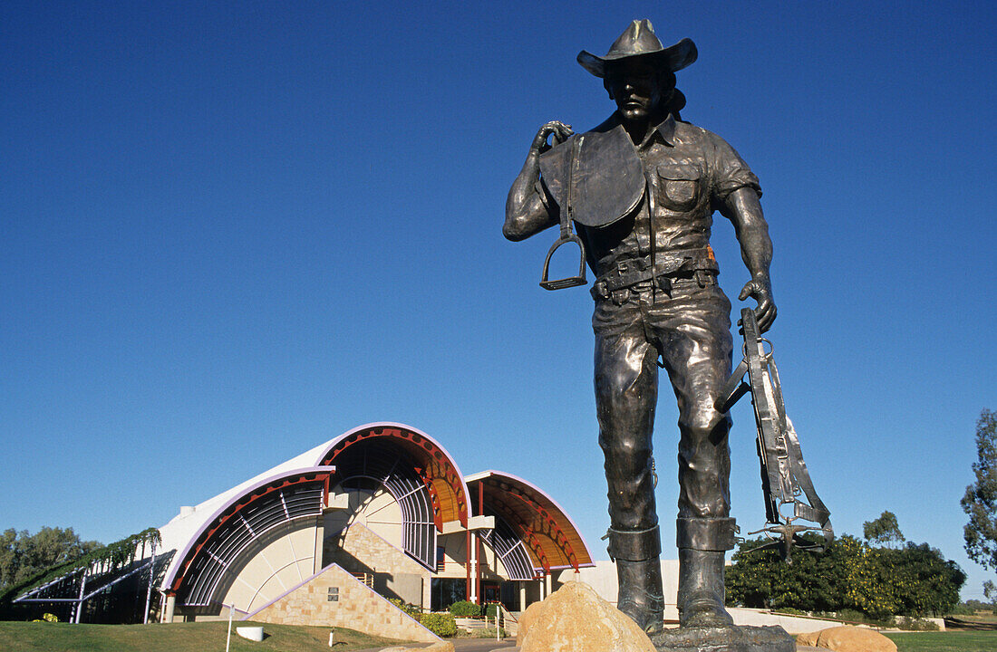Statue of a stockman outside the Australian Stockman's Hall of Fame museum, museum dedicated to the history of the outback settlers such as explorers, sheep shearers stockmen, Longreach, Queensland, Australia