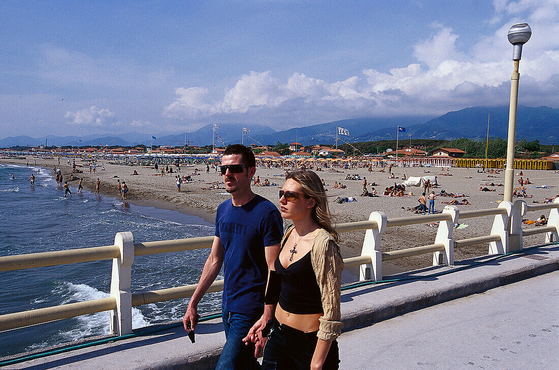 People on a promenade and on the beach, Forte dei Marmi, Tuscany, Italy, Europe