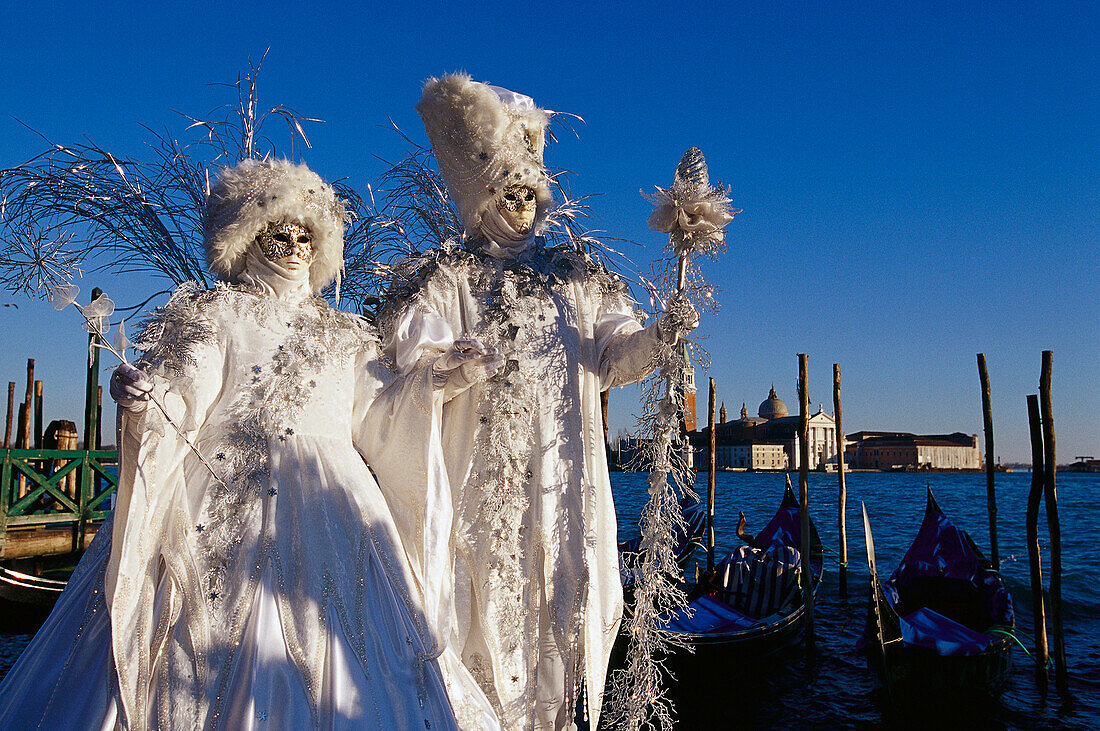 Two people in disguise at carnival, Venice, Italy, Europe
