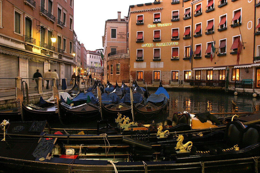 Gondolas in front of Hotel Cavalletto in Venice, Italy