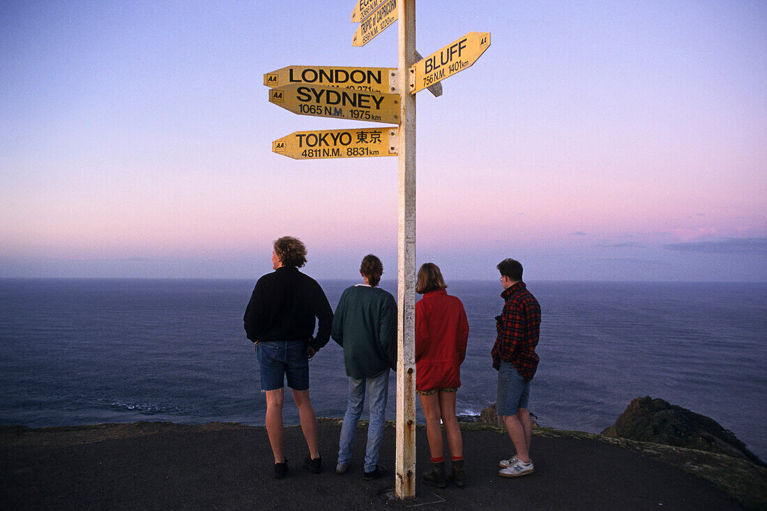 Direction sign, Cape Reinga, Tourists, distance signpost, tip of Northland, New Zealand, most northerly point
