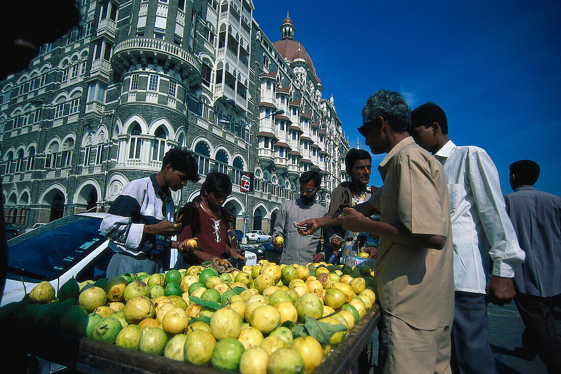 Fruit vendor in front of the Taj Mahal hotel, Bombay, India, Asia