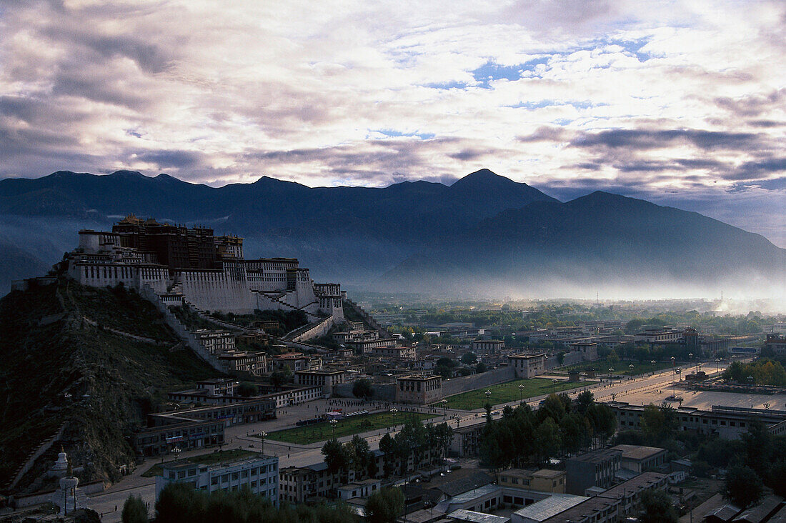 Potala palace under clouded sky, Lhasa, Tibet, Asia