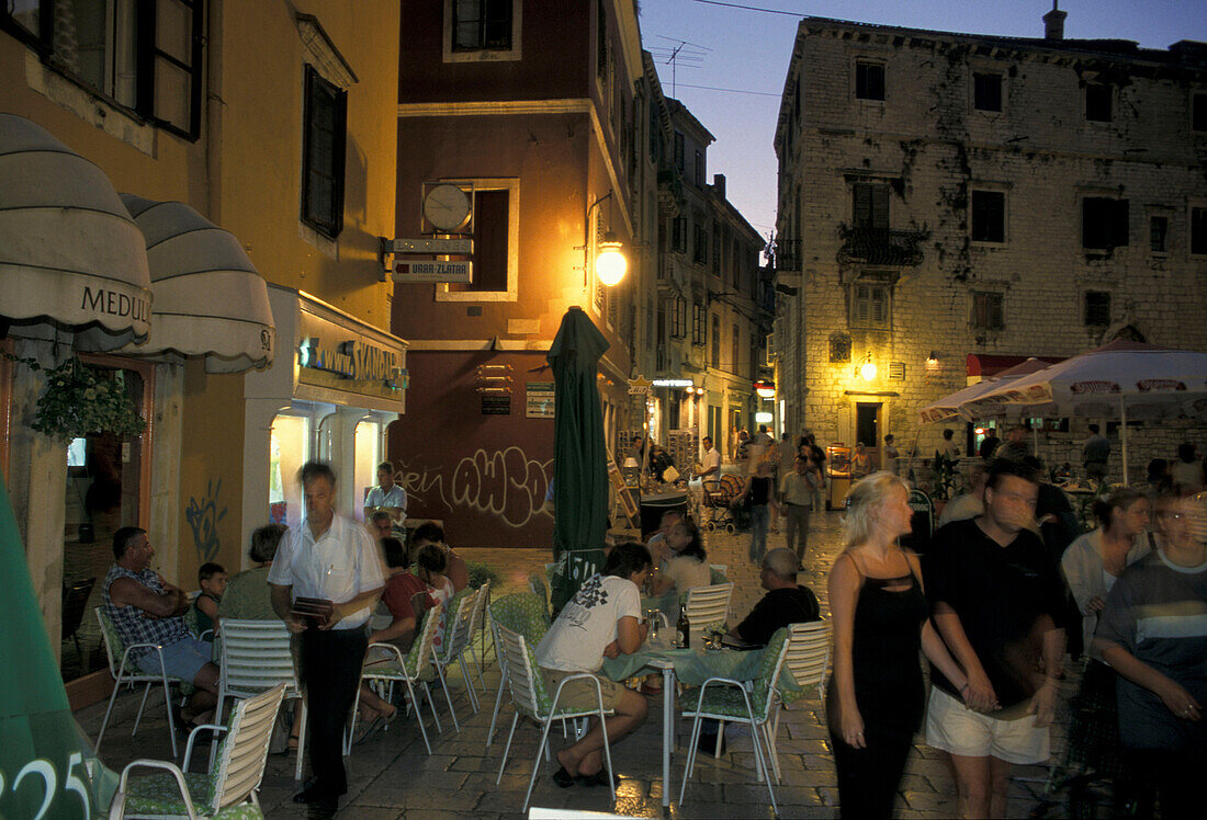People in restaurants at the old town in the evening, Sibenik, Croatia, Europe