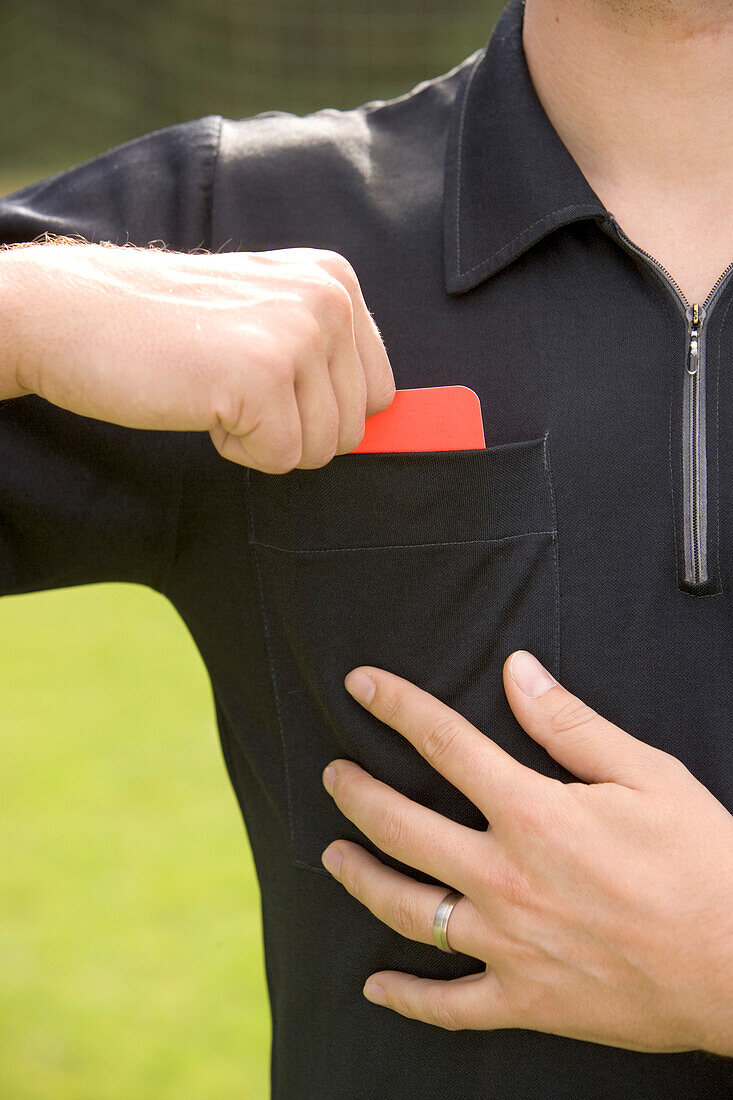 Referee showing red card