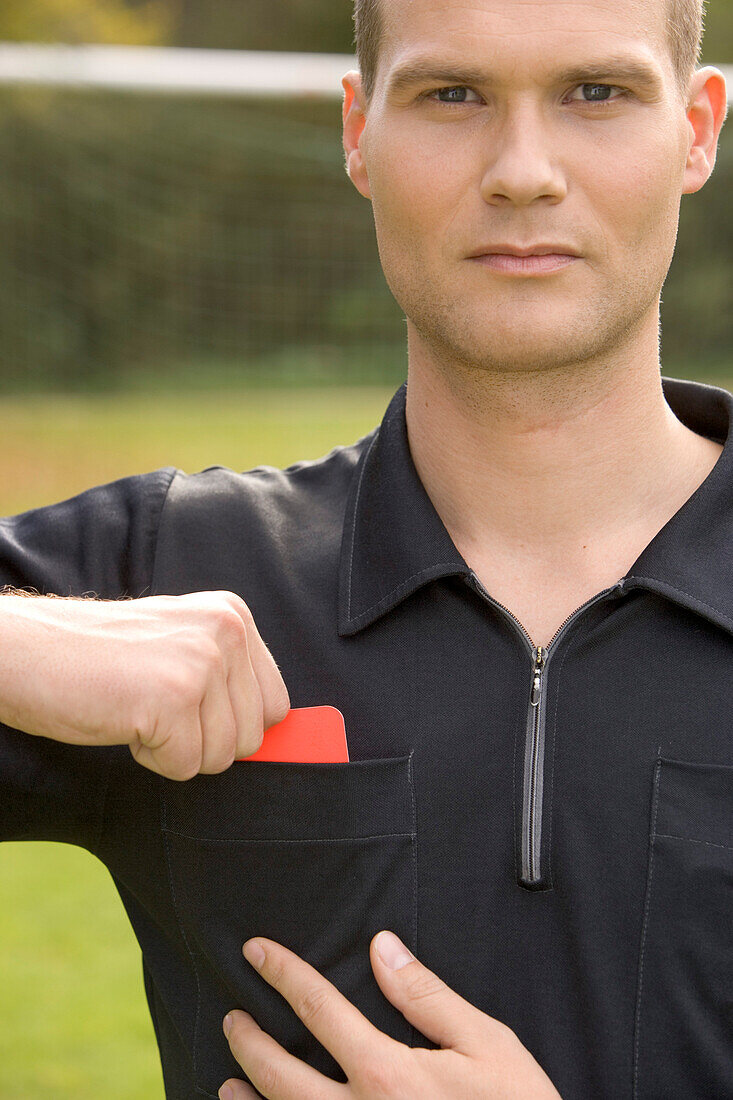 Referee showing red card