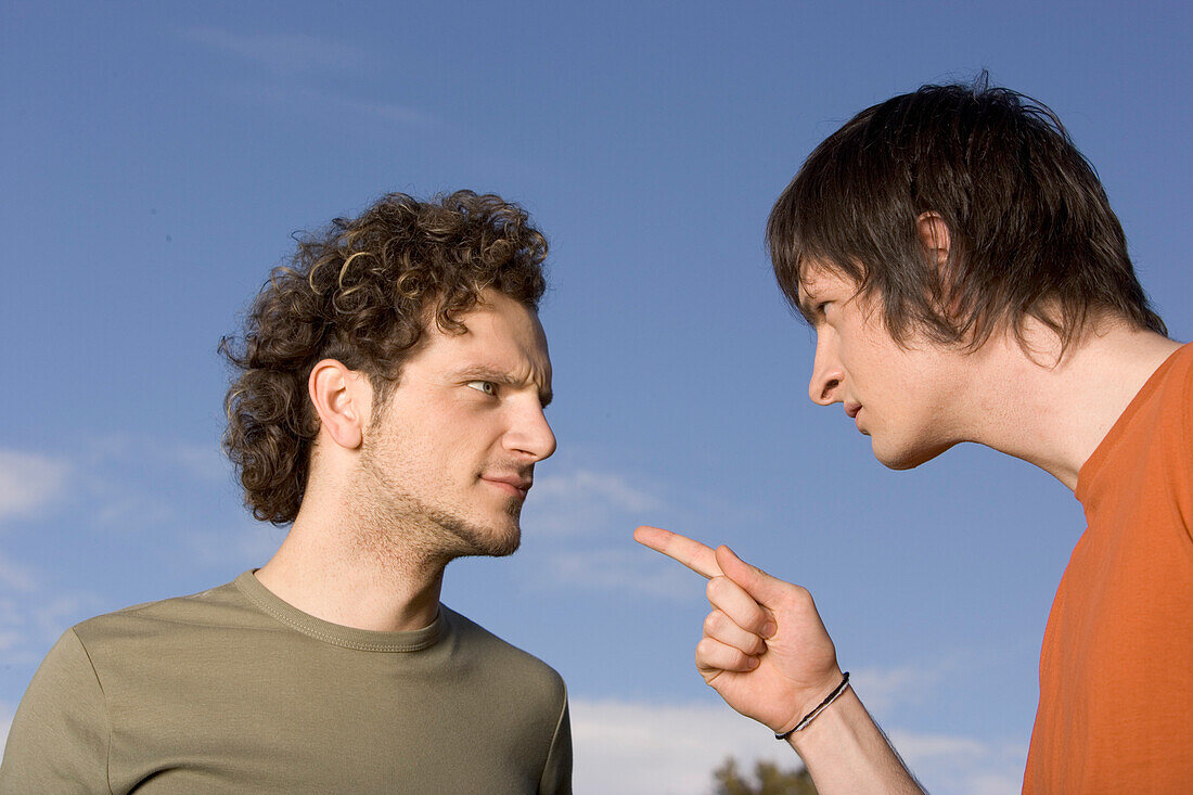 Two young man in disputes