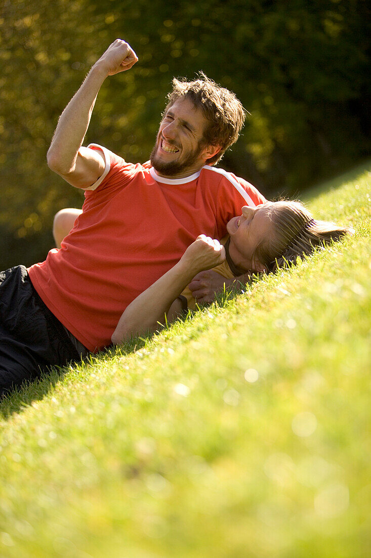 Young male soccer players jubilating