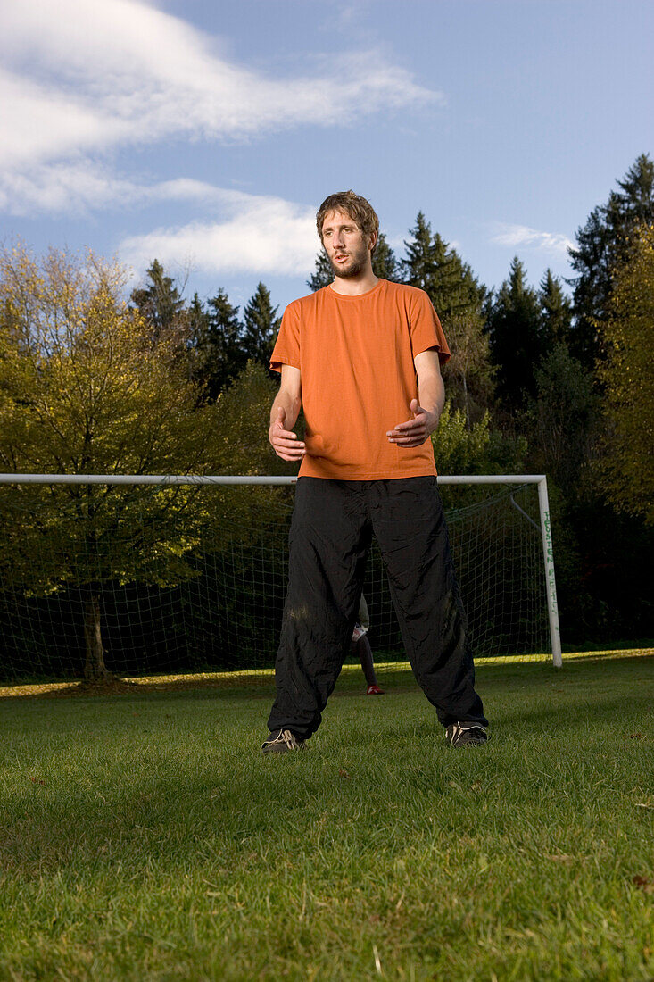 Young man on soccer field