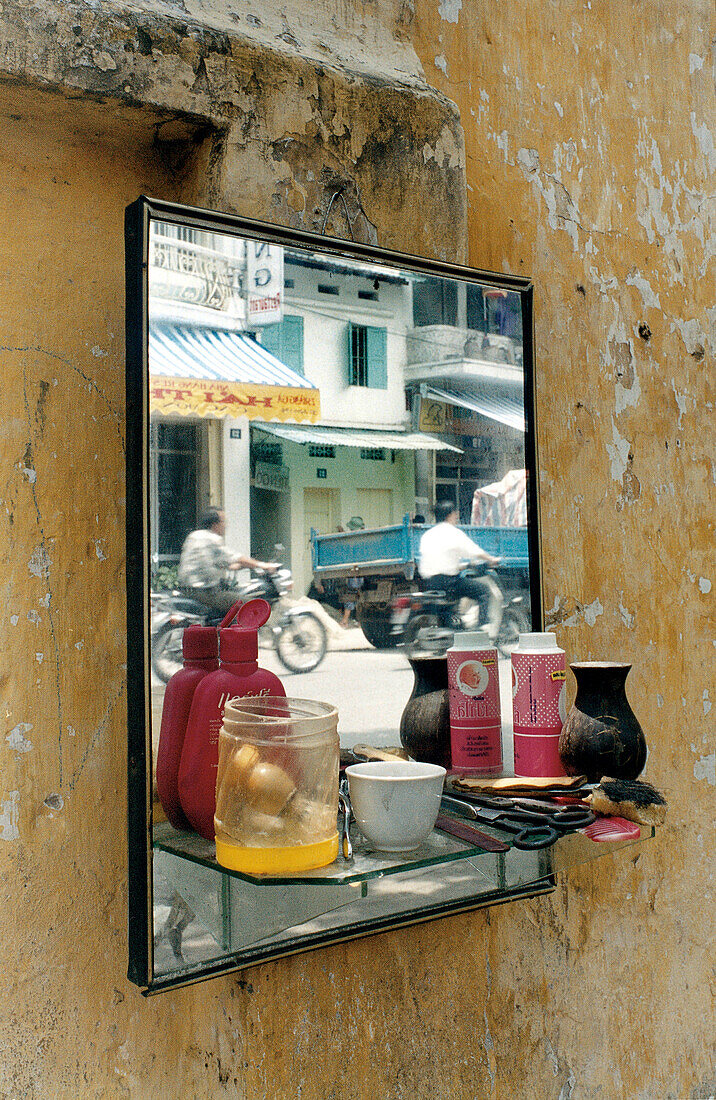 Mirror of a hairdresser, Hanoi, Vietnam