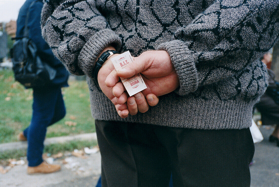 Hands with Busticket, Rome Italy