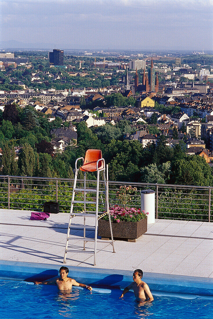 People at open air pool Opelbad, Neroberg, view over Wiesbaden, Hesse, Germany, Europe