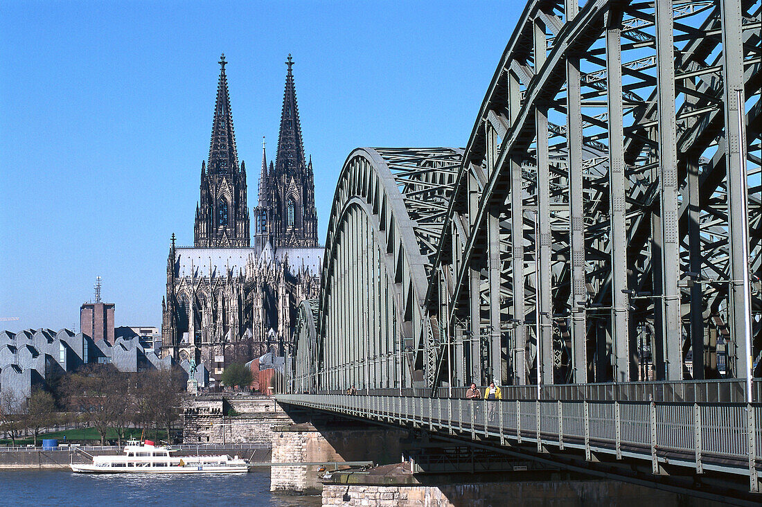 Cologne Cathedral and Hohenzollern bridge in the sunlight, Cologne, North Rhine-Westphalia, Germany, Europe