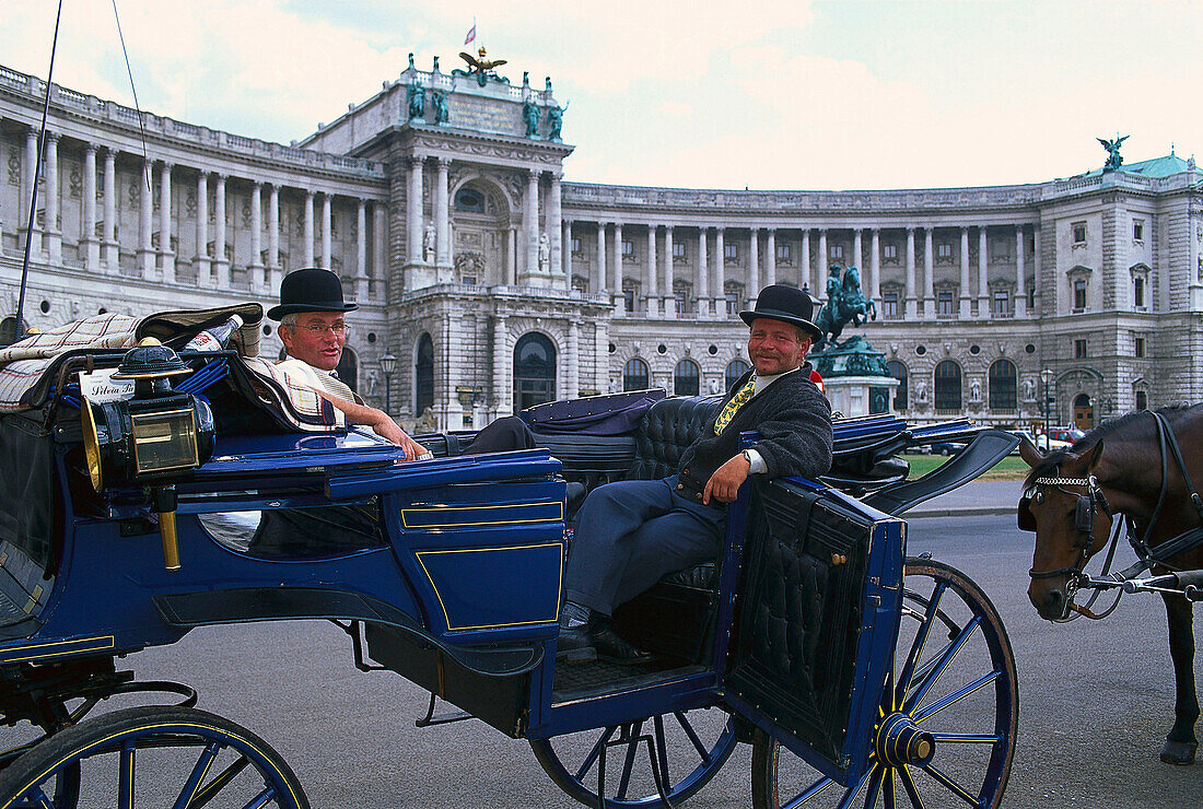 Two men in a fiaker in front of new Hofburg, Vienna, Austria, Europe