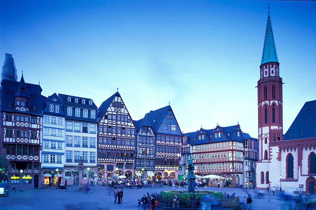 Half timbered houses and church Nikolaikirche at the market square in the evening, Roemerberg, Frankfurt, Hesse, Germany, Europe