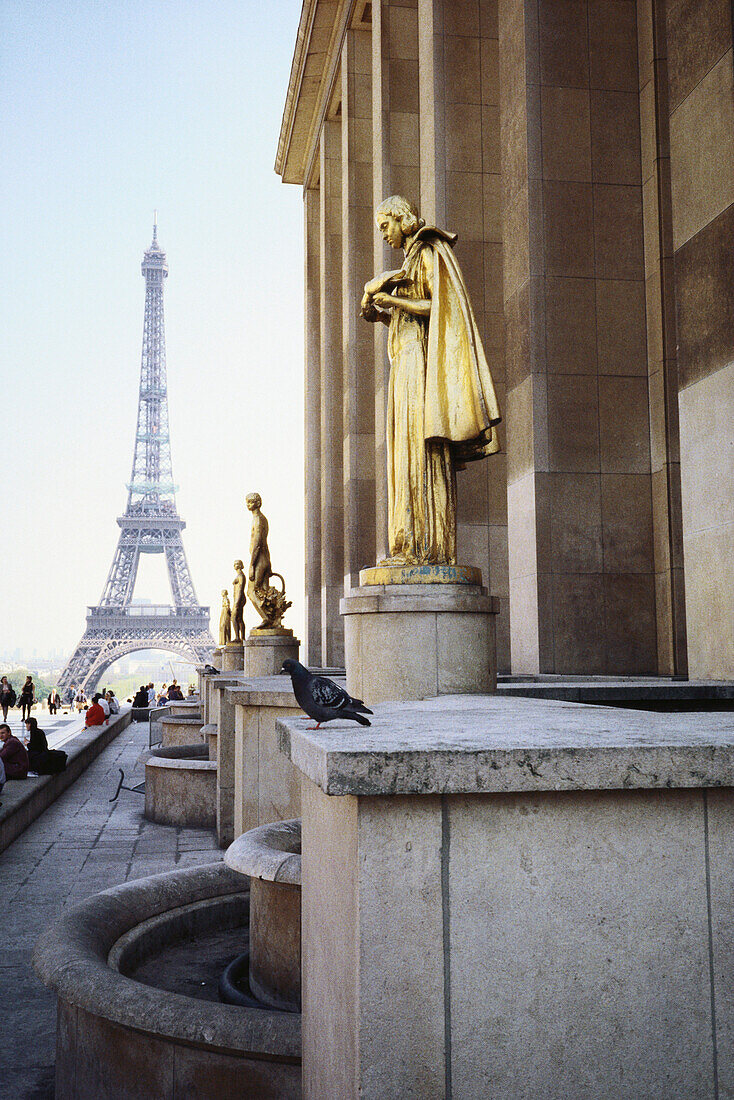 Golden statues and Eiffel tower, Paris, France, Europe
