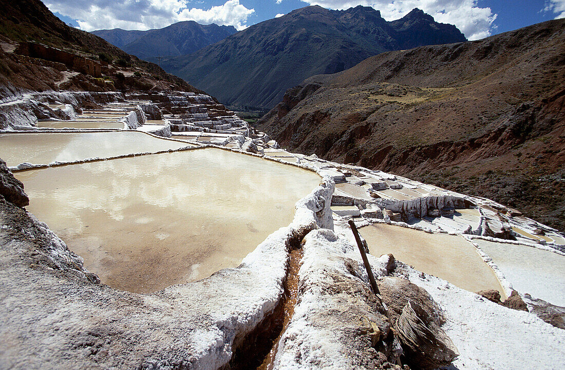 View at salt basin in the mountains, Maras, Peru, South America, America